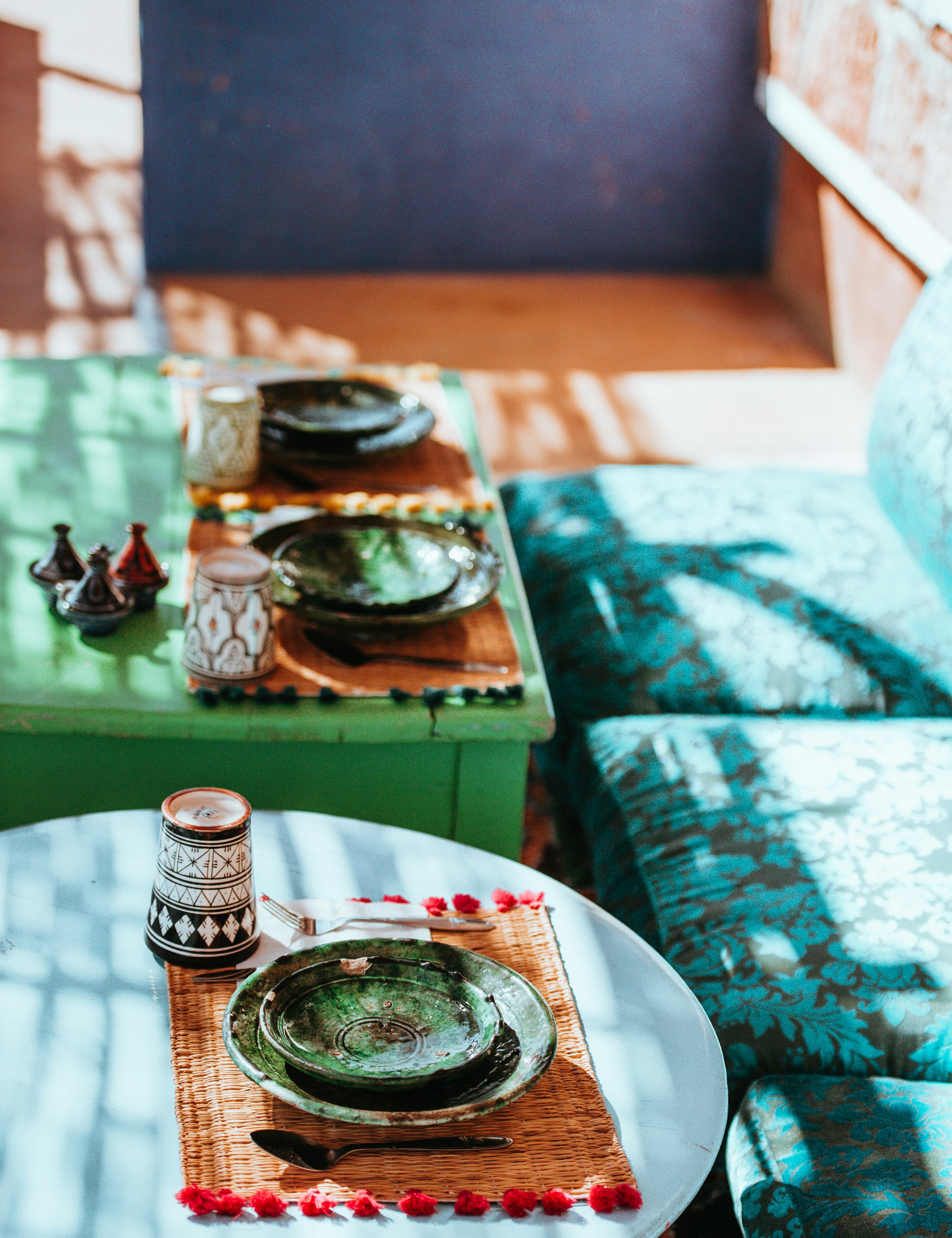 green ceramic bowl and plate on table